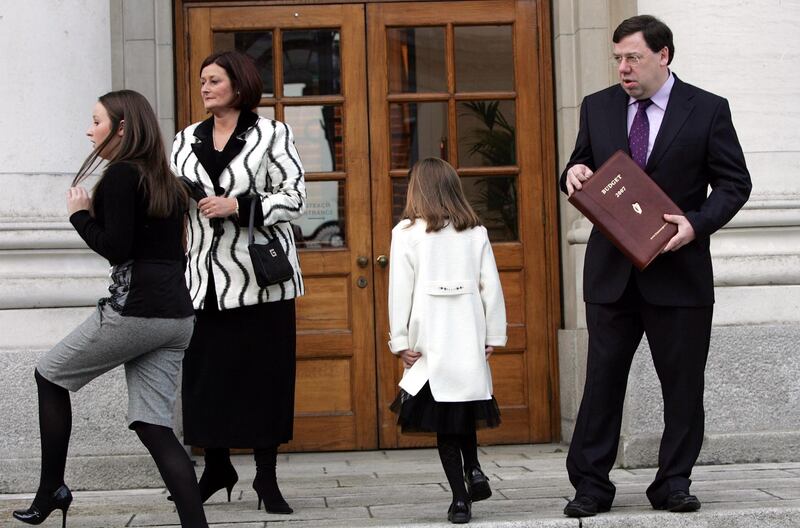 2007: Brian Cowen, his wife Mary and daughters Sinéad (15) and Maedhbh (8) at Government Buildings before presenting his budget. Photograph: Eric Luke