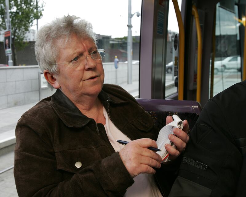 Nell McCafferty following then minister for health Mary Harney and  PD candidate Frank McNamara on the general election campaign trail in Dublin in 2007. Photograph: Frank Miller