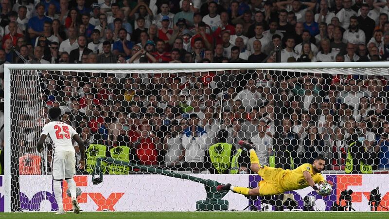 Donnarumma saves Saka’s penalty to win it. Photo: Paul Ellis/POOL/AFP via Getty Images