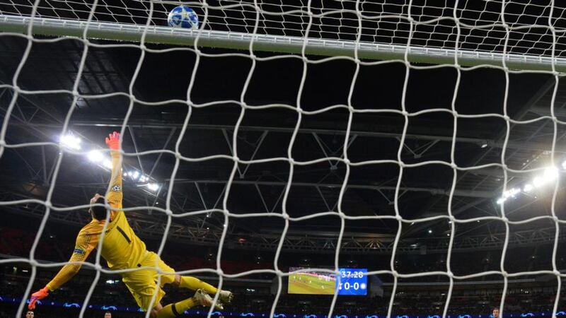 Tottenham Hotspur’s  Harry Winks sees his shot hit the bar. Photograph: Ben Stansall/Getty Images