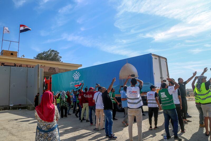 Humanitarian aid for the Gaza Strip passes the Rafah border gate in Egypt. Photograph: Mohammed Asad/AP