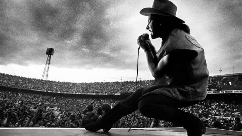 Bono performing onstage during the original Joshua Tree tour in 1987. Many fans have been outpriced in the race for tickets to the 30th anniversary tour. Photograph: Lex van Rossen/MAI/Redferns
