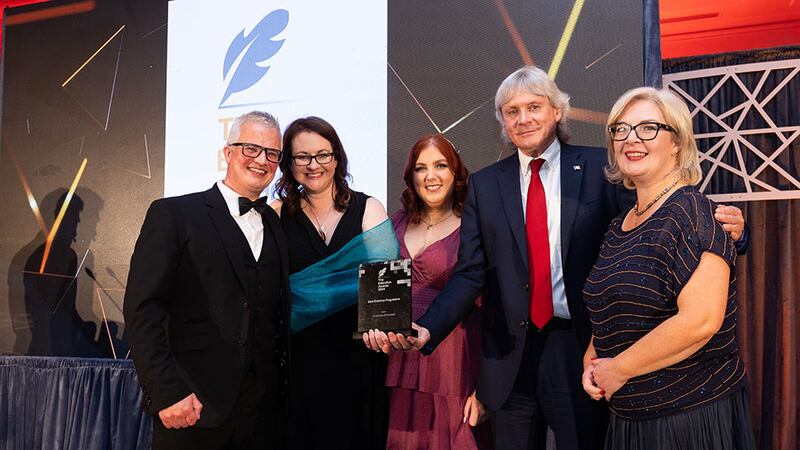 Tomas Finneran, awards judge, presents the best Erasmus programme award to the University of Limerick team