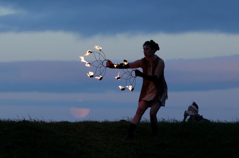 Justine Nguyen from Meath at the Hill of Tara on the night of the summer solstice. Photograph: Alan Betson