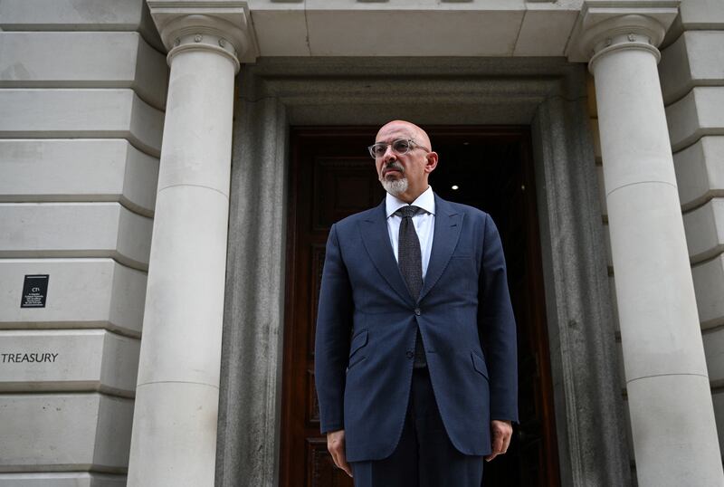 Nadhim Zahawi poses for a photograph as he arrives at the Treasury on Tuesday to begin his new job as chancellor of the exchequer. Photograph: Daniel Leal/AFP via Getty Images