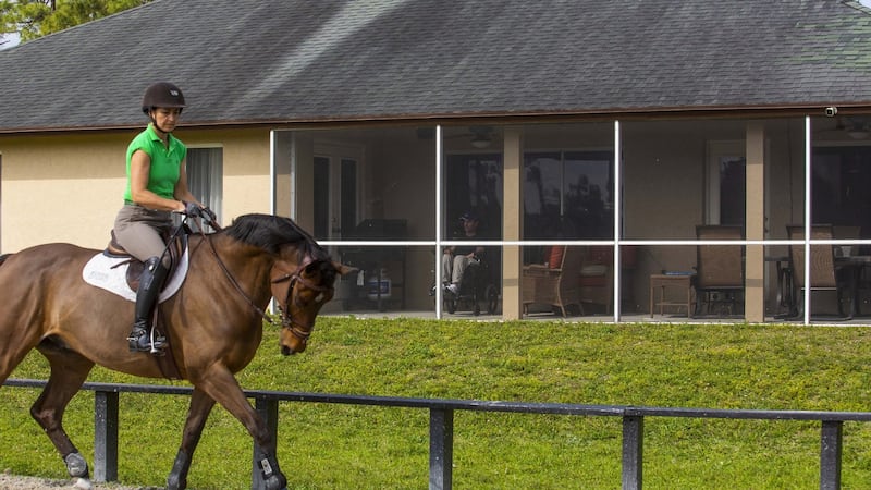 Kevin Babington coaches students from inside his home in Florida. Photograph: Saul Martinez/NYT