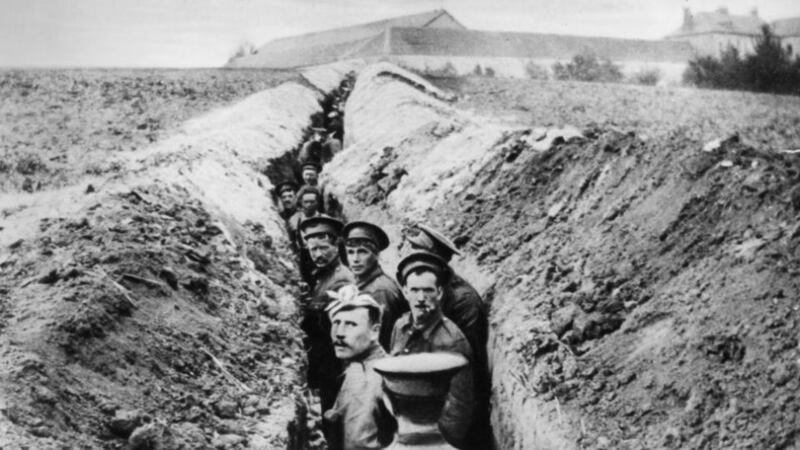 British soldiers lined up in a narrow trench in the early days of the war. Photograph: Hulton Archive/Getty Images