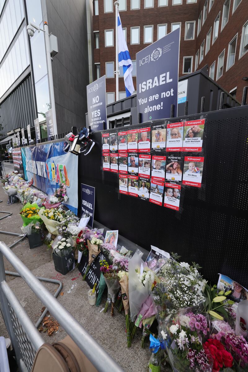 Photographs and flowers outside the Israeli embassy in Dublin after a protest march in support of Israel. Photograph: Alan Betson 