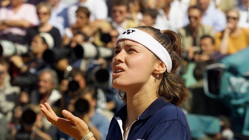 Martina Hingis of Switzerland disputes a line call during the final. Photograph: Jacques Demarthon/AFP via Getty Images