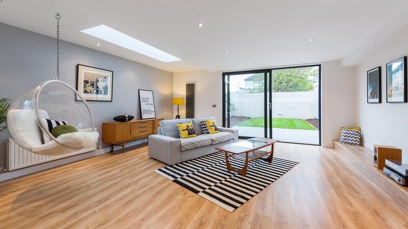 Open plan livingroom of 107 Church Road, East Wall, D3