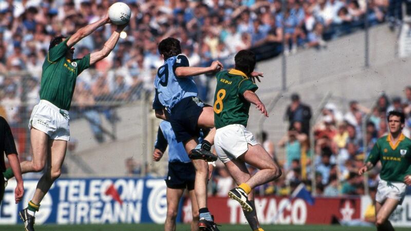 Meath and Dublin players contest a high ball during the fourth game of the  1991 series of Leinster Championship games. Photograph: Inpho