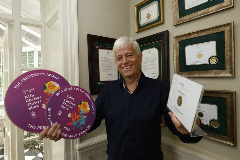 Billy Alexander with his gardening awards.
