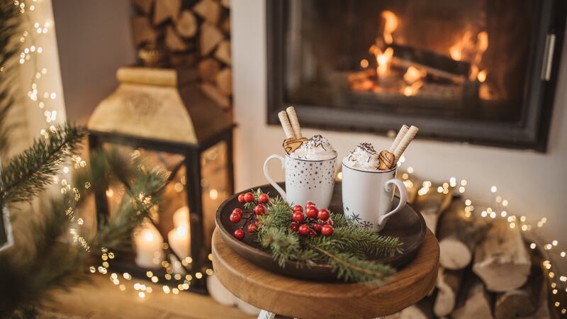 ‘I like traditional decorations with lots of greens, burgundies and white lights dressed with pine cones and the scent of the natural Christmas tree,’ says Hugh Wallace