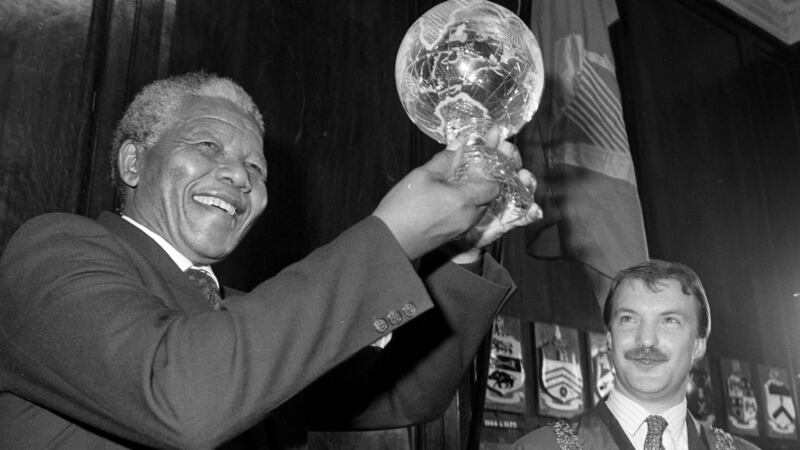 Lord Mayor of Dublin Seán Haughey with Nelson Mandela after presenting the South African leader with crystal globe during his visit to Ireland in 1990. Photograph: Frank Miller