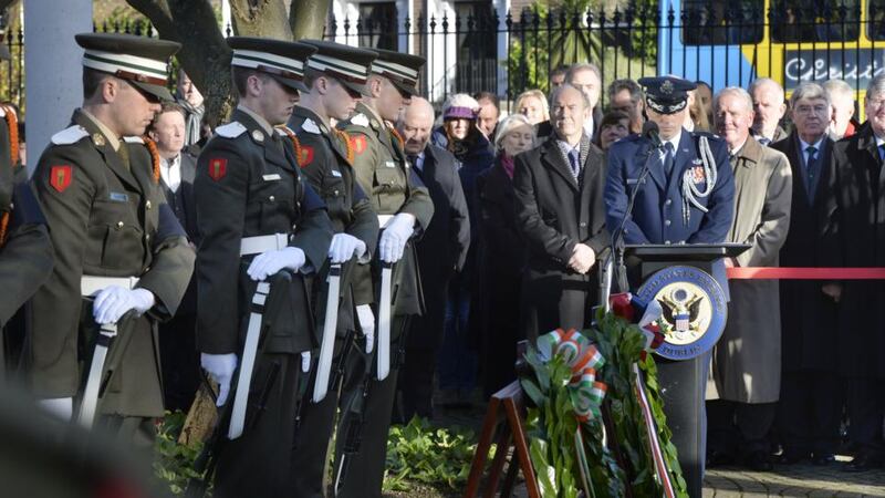 Tánaiste Eamon Gilmore and Stuart Dwyer, US charge d’affaires, lay wreaths during a ceremony at the US embassy in Ballsbridge, Dublin, to commemorate the 50th anniversary of the death of President John F Kennedy in Dallas. Photograph: Alan Betson / The Irish Times