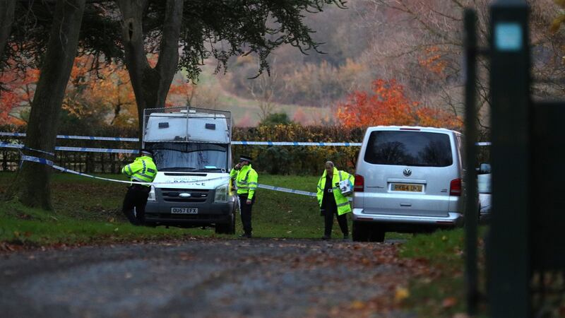 Police at the scene near Waddesdon, in Buckinghamshire, where a mid-air collision between a helicopter and an aircraft has resulted in four deaths. Photograph: Aaron Chown/PA Wire