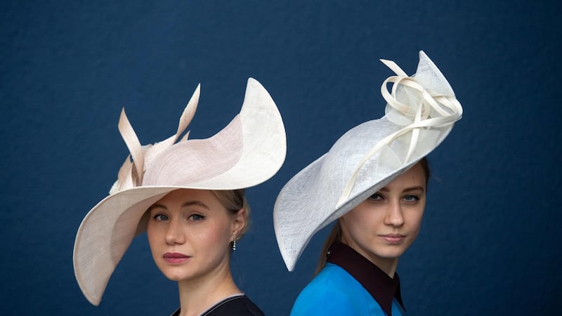 It’s all about the tilt, when it comes to hats. Photograph: Daniel Leal-Olivas/AFP/Getty Images