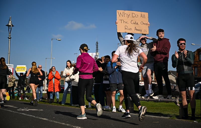 Supporters cheer on participants during the Dublin City Half Marathon. Photograph: Sam Barnes/Sportsfile