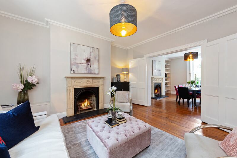 Drawing room opening to dining room.