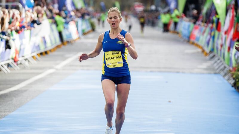 Laura Graham  crossings the line to be the first Irish finisher in the women’s category during the SSE Airtricity Dublin Marathon in 2017. Photograph: Ryan Byrne/Inpho