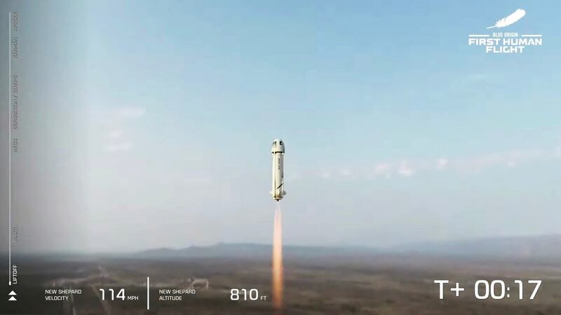 Jeff Bezos and his crew taking   off on Tuesday aboard   Blue Origin’s New Shepard rocket. Photograph: Blue Origin/EPA