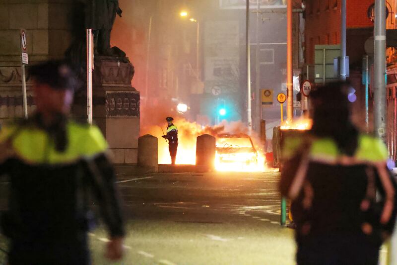 Gardaí confront rioters at the top of Dublin's O’Connell Street last year. Photograph: Alan Betson/The Irish Times