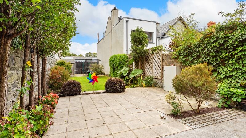 Patio and back garden with access to Dartmouth Terrace