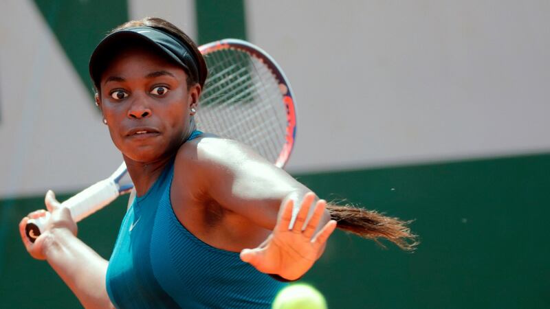 Sloane Stephens plays a return to  Arantxa Rus during their women’s singles first-round match on day one of The French Open at Roland Garros in Paris. Photograph:  Thomas Samson/AFP/Getty Images