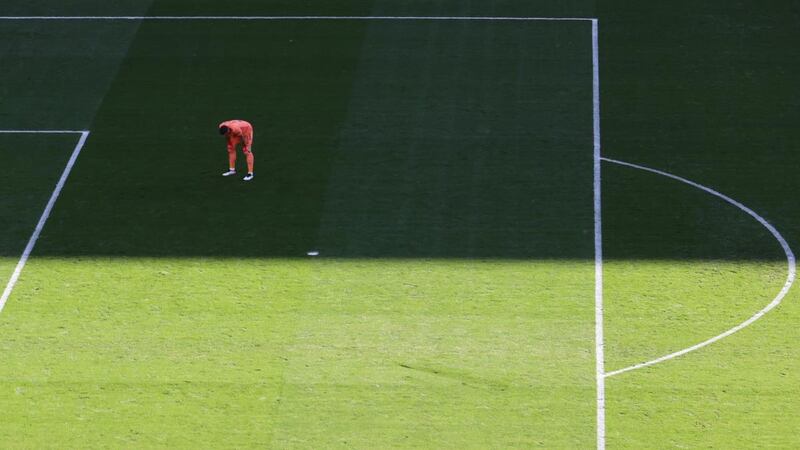 Spain’s Unai Simon on his haunches after letting in Croatia’s opener. Photograph:  Wolfgang Rattay/Getty