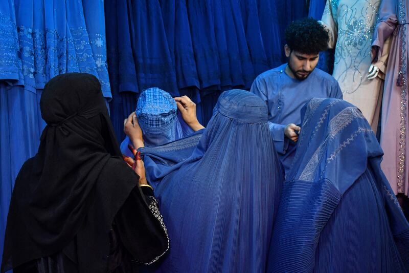 Women shopping for burqas in Mazar-i-Sharif, Afghanistan. Photograph: Atif Aryan/AFP via Getty Images  