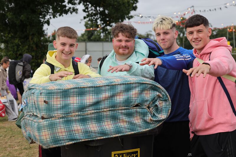 Electric Picnic 2025: Michael Guiry, Eoghan Goggin, Billy O’Sullivan and Kevin O’Connell from Cork on their way into the festival with 'Mattress Mick'. Photograph: Alan Betson

