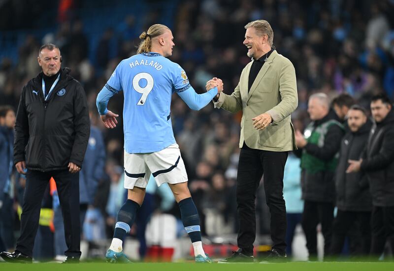 Haaland talking to Peter Schmeichel following the match against Arsenal. Photograph: Michael Regan/Getty Images