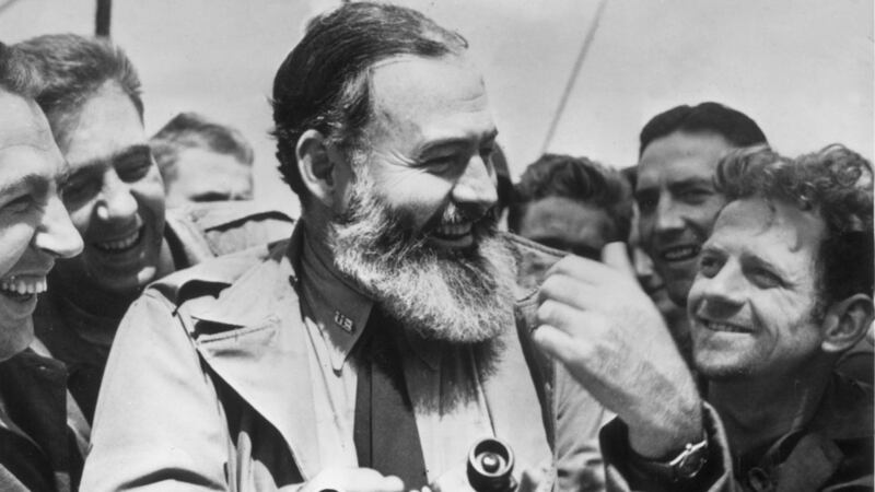 War correspondent Ernest Hemingway with American combat troops prior to D-Day in June 1944. Photograph: Central Press/Getty Images