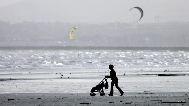 When hours spent on paid employment are accounted for, women still carry out more hours of care than men. Photograph: Bryan O’Brien