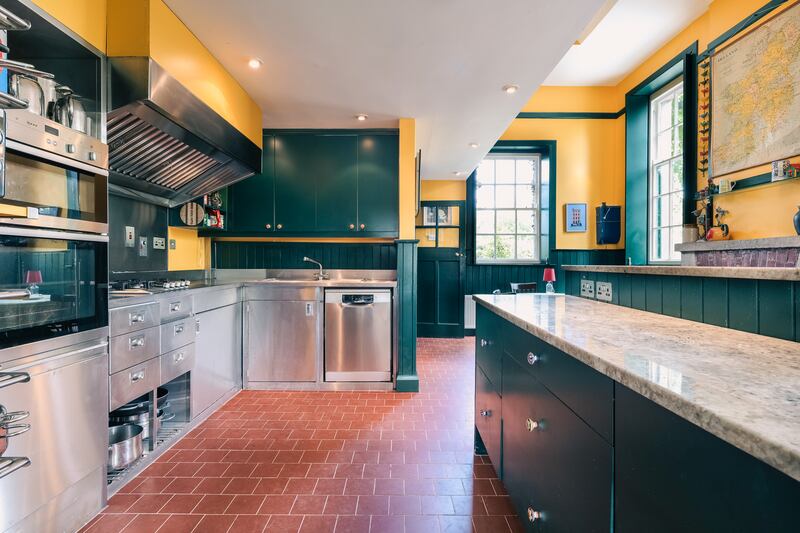 The statinless-steel kitchen has an almost commercial feel to it