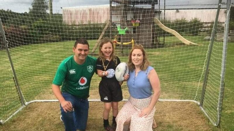 Kenny and Naomi with their daughter, Eva-Belle.