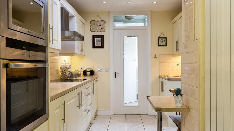 52 Clarence Mangan Road: a sweet 94sq m (1,012sq ft) end of terrace, with a sunny back garden, three bedrooms and new kitchen.