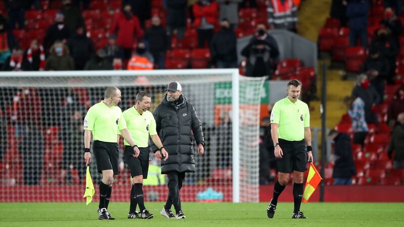 Jürgen Klopp speaks to match officials after the final whistle. Photo: Nick Potts/PA Wire