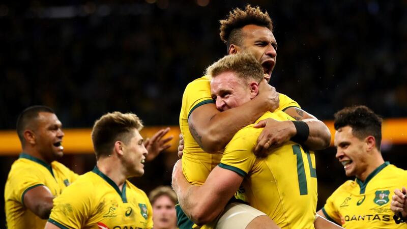 Will Genia  congratulates Reece Hodge  after scoring a try during the  Rugby Championship match between Australia and New Zealand at Optus Stadium in Perth. Photograph: Cameron Spencer/Getty Images