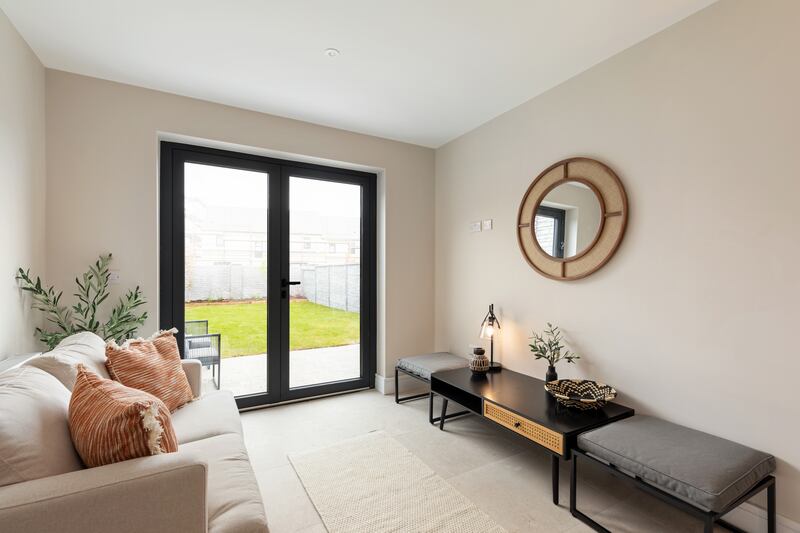 Living area in kitchen/dining/livingroom of four-bed