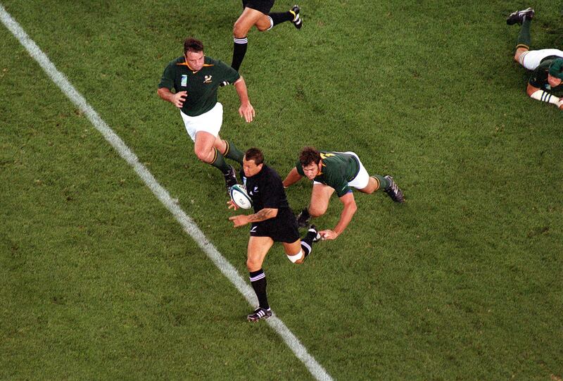 Spencer weaves his way through the Springbok defence during the Rugby World Cup quarter final in 2003. Photograph: Joe Mann/Offside via Getty