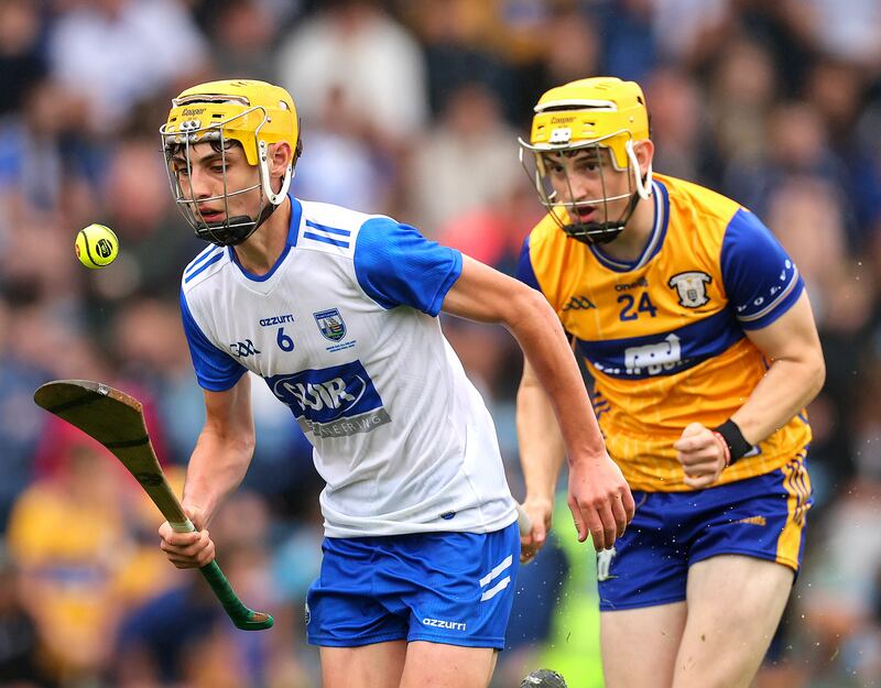 Waterford's Hugo Quann in action against Clare's Jake Gibbons. Photograph: Tom O'Hanlon/Inpho