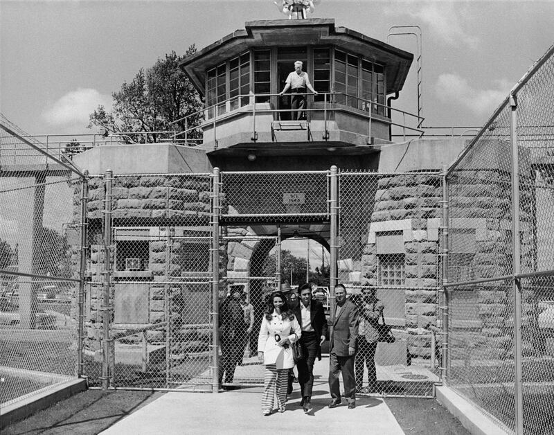 Johnny Cash and June Carter Cash leave Kansas State Prison, where Cash and the Carter Family performed in 1970. Photograph: Hulton/Getty