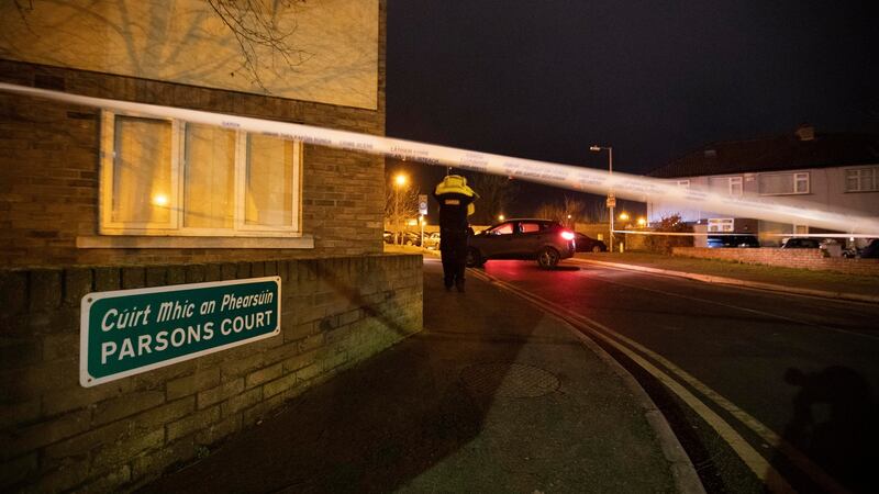 Gardaí at the scene at Parson’s Court, Newcastle, Co Dublin where the bodies of three children were discovered in a house. Photograph: Colin Keegan/Collins Dublin