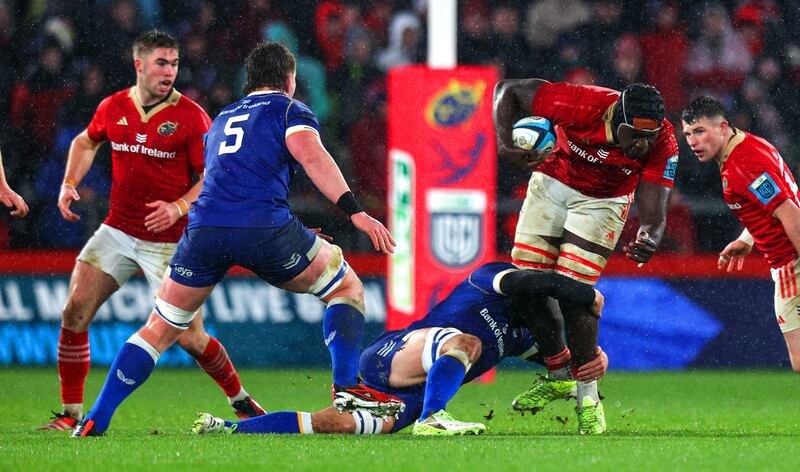 Munster’s Edwin Edogbo tackled by Max Deegan of Leinster during the URC clash at Thomond Park. Photograph: Ryan Byrne/Inpho