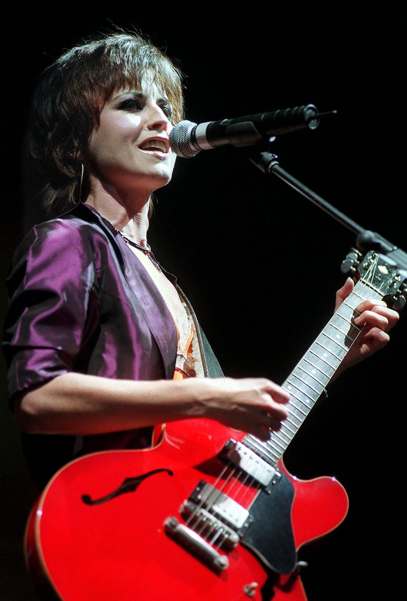 Dolores O'Riordan appearing with The Cranberries at Dublin Castle in 2000. 'When I wrote about her death for the New York Times at the time, I cited how small she always looked behind those large guitars she played. Really, they were just guitars, and she was just tiny, a contrast that made sense: human fragility behind the protection of a big instrument.' Photograph: Eric Luke