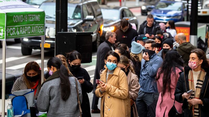 People queue to be tested for Covid-19 in Lower Manhattan on Thursday. Photograph: Dave Sanders/New York Times