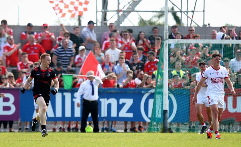 Louth’s Donal McKenny celebrates scoring his side’s first goal of the game against Cork in the championship preliminary quarter-final.
Photograph: Ryan Byrne/Inpho