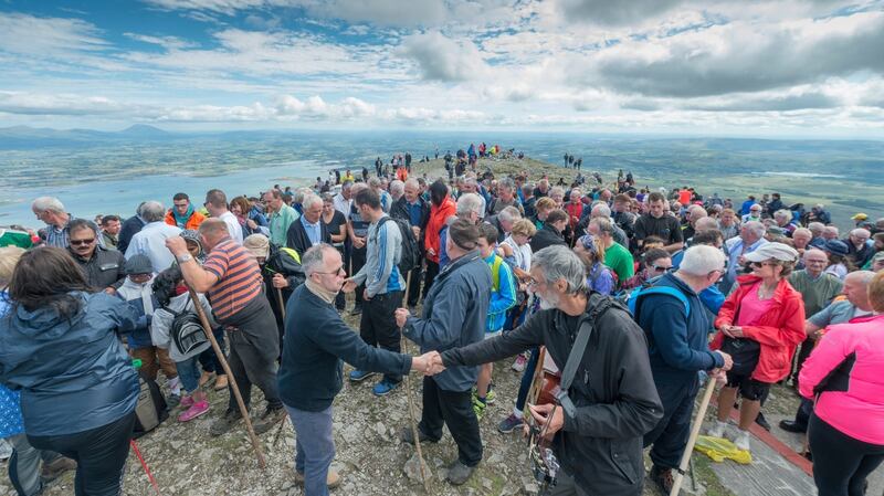 Pilgrims on the sumitt of Croagh Patrick on Reek Sunday. Photograph: Michael McLaughlin