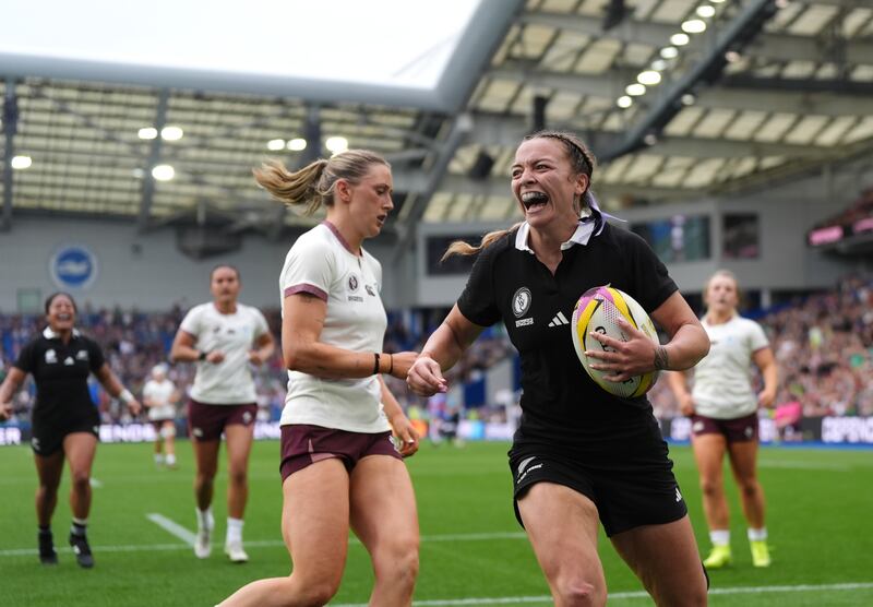 New Zealand's Renee Holmes celebrates a try that is later disallowed. Photograph: Ben Whitley/PA